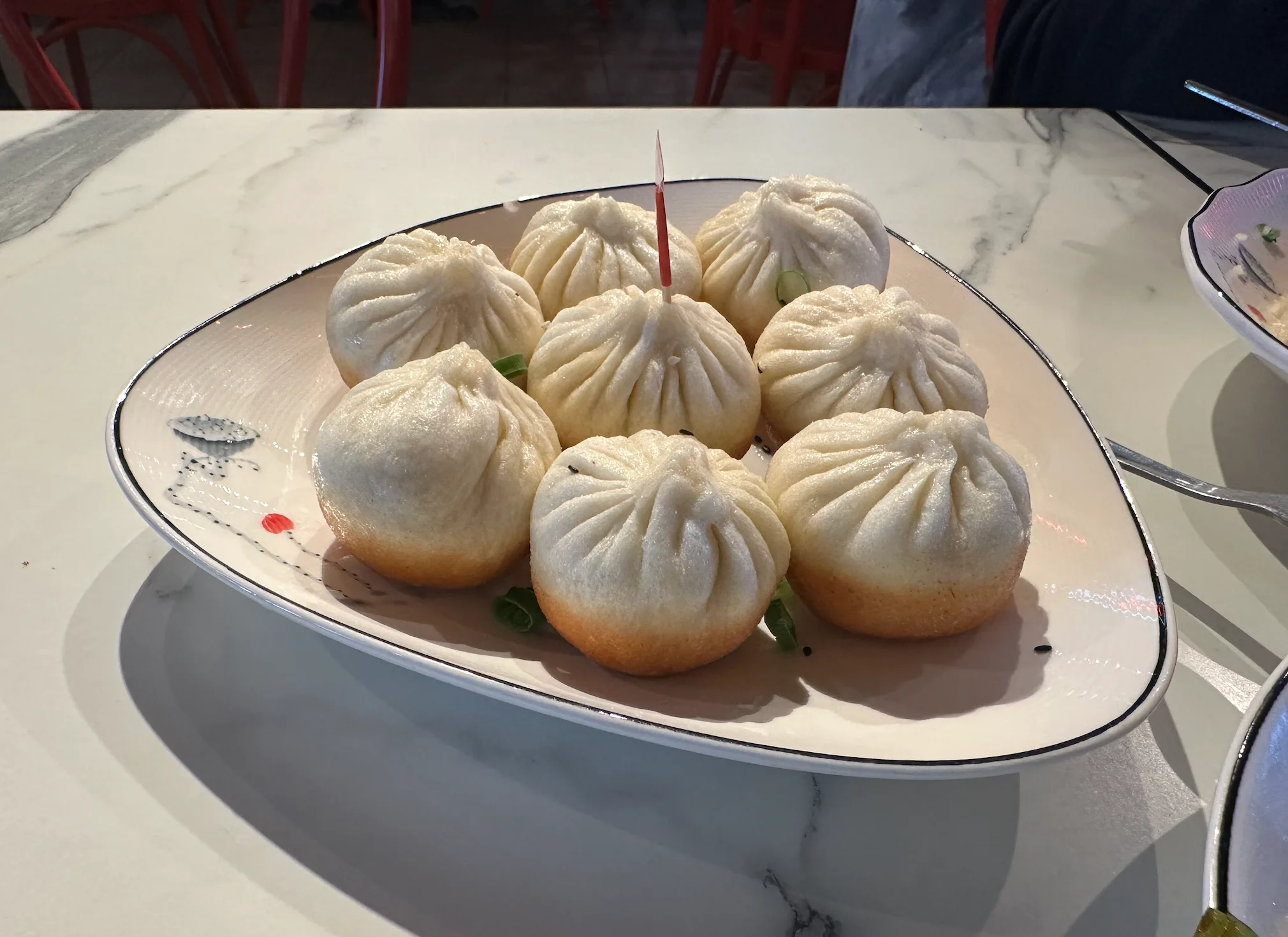 Signature dish Shanghai soup dumplings served at LiLong by Taste of Shanghai Chatswood